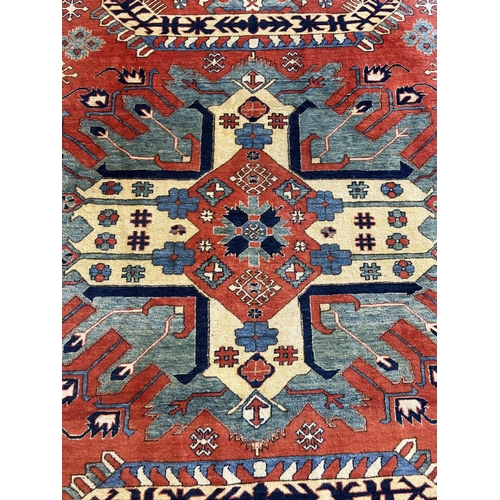 130 - FINE EAGLE KAZAK CARPET, 315cm x 255cm.