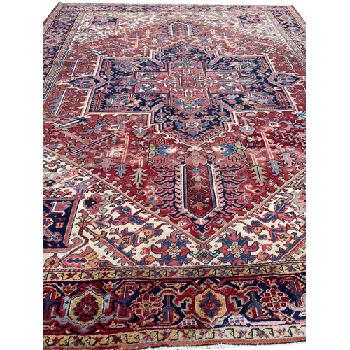 131 - ANTIQUE NORTH WEST PERSIA HERIZ CARPET,  360cm x 290cm.