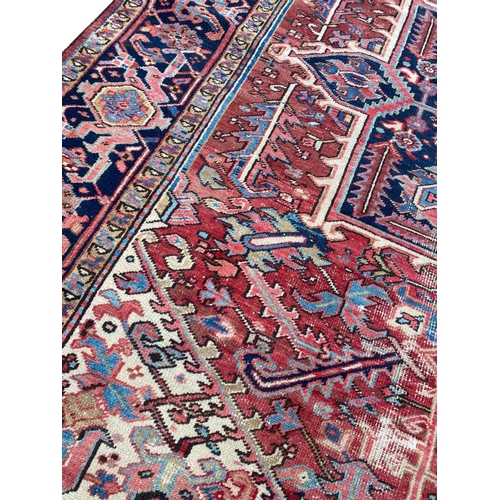 131 - ANTIQUE NORTH WEST PERSIA HERIZ CARPET,  360cm x 290cm.