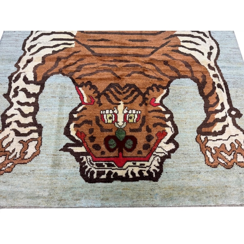 138 - FINE TIBETAN TIGER CARPET SIZE, 300cm X 201cm.