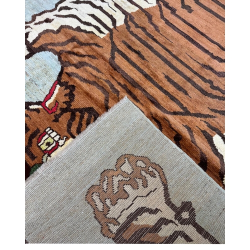 138 - FINE TIBETAN TIGER CARPET SIZE, 300cm X 201cm.