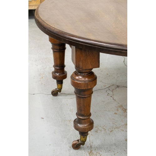 217 - DINING TABLE, Victorian oak, circa 1870 with four extra leaves on six legs and ceramic castors, 74cm... 