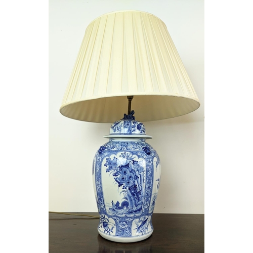 219 - TABLE LAMPS, a pair, converted from Chinese blue and white temple jars, with shades, 90cm H. (2)