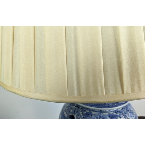 219 - TABLE LAMPS, a pair, converted from Chinese blue and white temple jars, with shades, 90cm H. (2)