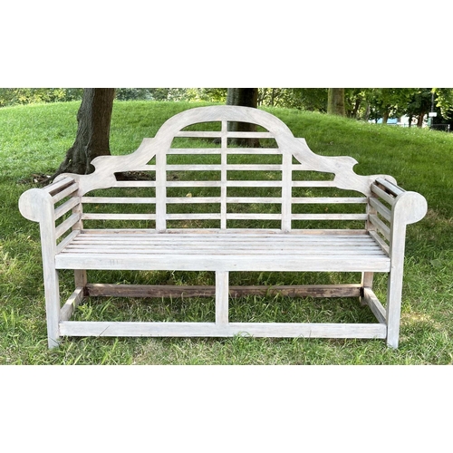 264 - LUTYENS STYLE GARDEN BENCH, well weathered teak of slatted and dowelled construction after the desig... 