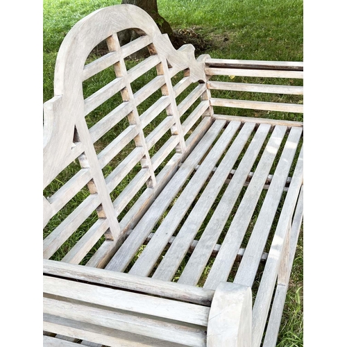 264 - LUTYENS STYLE GARDEN BENCH, well weathered teak of slatted and dowelled construction after the desig... 