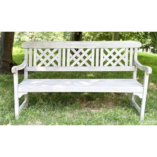 268 - LATTICE GARDEN BENCH, weathered teak with slatted seat and lattice panelled back, 147cm W.