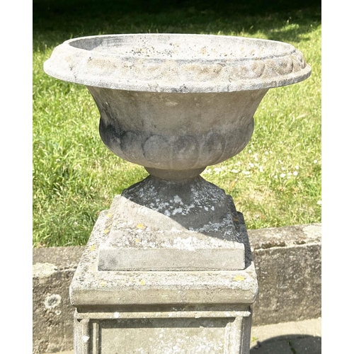 269 - GARDEN URNS, a pair, weathered reconstituted stone each on plinth bases with lattice panels, 119cm H... 