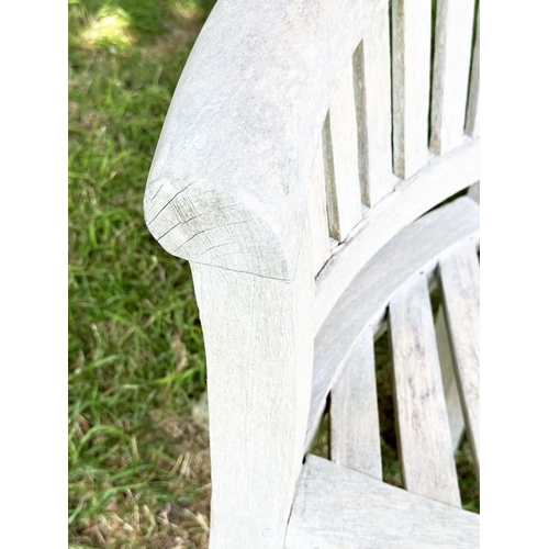 271 - BANANA GARDEN BENCH, well weathered teak of slatted construction with rounded back and arms, 158cm W... 