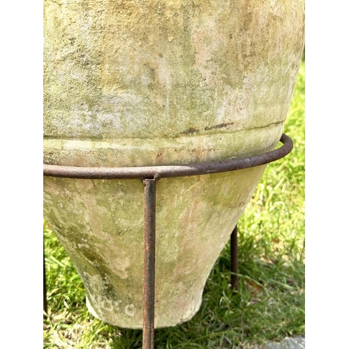 274 - GARDEN AMPHORA, vintage weathered terracotta with moulded loop handles and glazed neck on iron stand... 