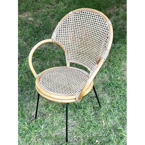 275 - TERRACE ARMCHAIRS, a pair, 1970s rattan framed wicker panelled and cane bound with metal supports, 6... 