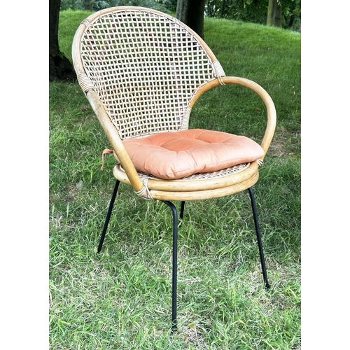 275 - TERRACE ARMCHAIRS, a pair, 1970s rattan framed wicker panelled and cane bound with metal supports, 6... 