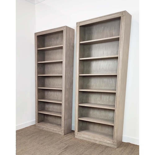 398 - OKA TALL ASHMOLEAN BOOKCASES, a pair, by Sue Jones, 89cm x 28cm x 219cm. (2)