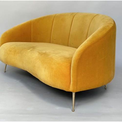 402 - HEAL'S BLOOMSBURY SOFA, soft primrose yellow velvet upholstered with curved back and splay gilt meta... 