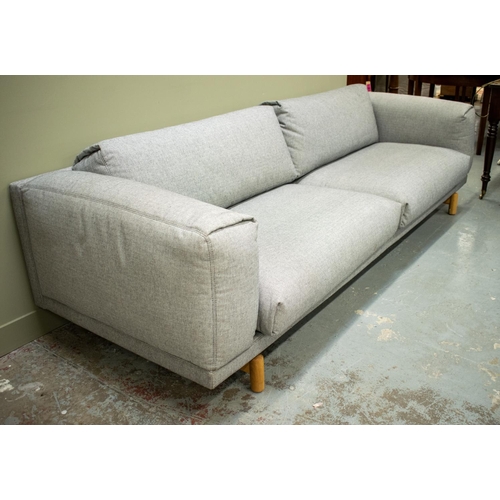 451 - SOFA, light grey fabric with loose seat and back cushions on oak legs, 76cm H x 265cm W x 101cm D.