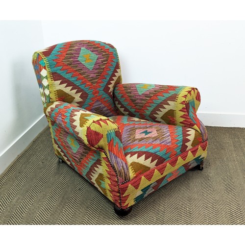 277 - ARMCHAIR, early 20th century in kilim upholstery, 78cm H c 95cm W.