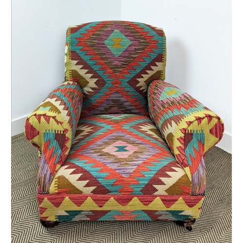 277 - ARMCHAIR, early 20th century in kilim upholstery, 78cm H c 95cm W.