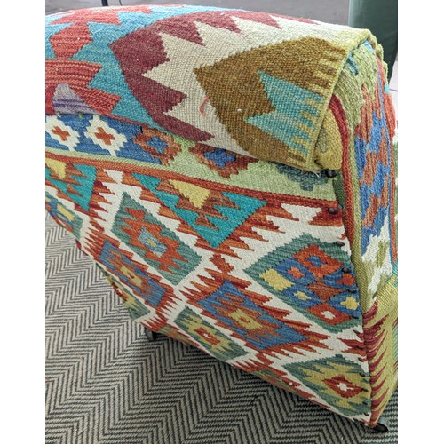 277 - ARMCHAIR, early 20th century in kilim upholstery, 78cm H c 95cm W.