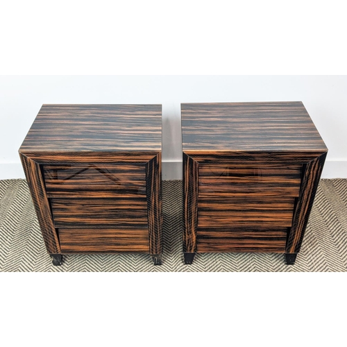 357 - SIDE CHESTS, a pair, faux macassar finished glass, with three drawers to each, 46cm x 30.5cm x 58.5c... 