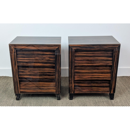 357 - SIDE CHESTS, a pair, faux macassar finished glass, with three drawers to each, 46cm x 30.5cm x 58.5c... 