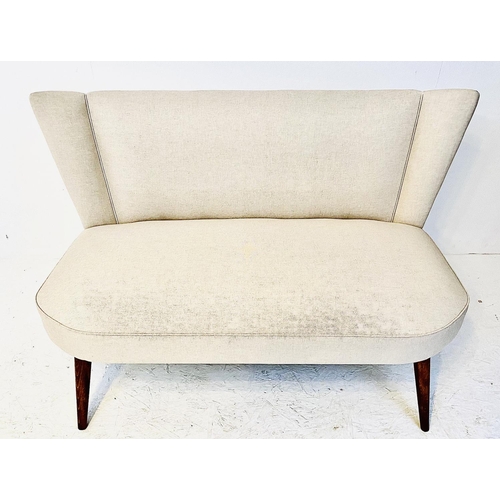 362 - SOFA, 1950's Italian style, with neutral upholstery on tapered supports, 179cm H x 127cm W x 58cm D.