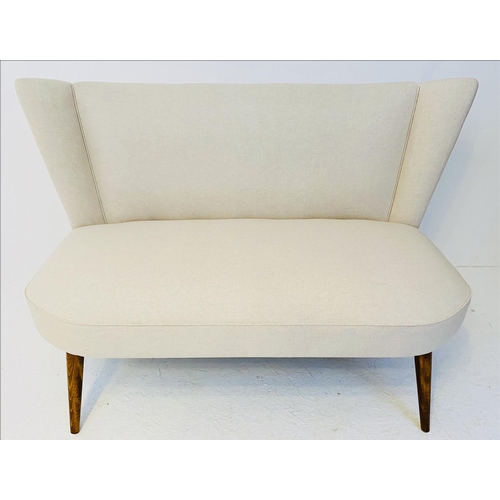 362 - SOFA, 1950's Italian style, with neutral upholstery on tapered supports, 179cm H x 127cm W x 58cm D.