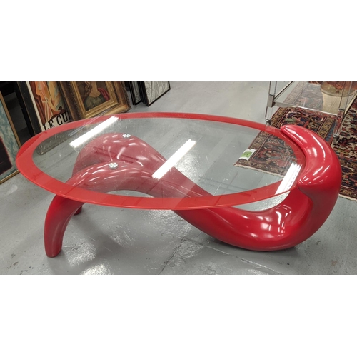 415 - LOW TABLE, contemporary glass and red fibre glass base, 122cm x 40cm H.