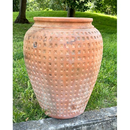 266 - GARDEN URN, very large weathered terracotta with moulded rim and all over coffered decoration, 99cm ... 