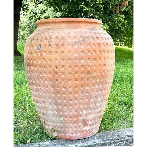 266 - GARDEN URN, very large weathered terracotta with moulded rim and all over coffered decoration, 99cm ... 