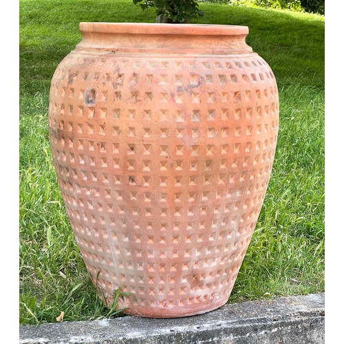 266 - GARDEN URN, very large weathered terracotta with moulded rim and all over coffered decoration, 99cm ... 