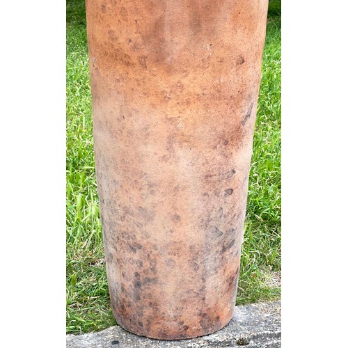 272 - GARDEN URN, tall weathered terracotta with moulded handles and rope swag decoration, 110cm H.