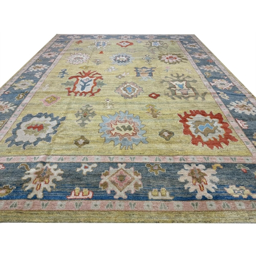 121 - FINE TURKISH OUSHAK CARPET, 415cm x 317cm.