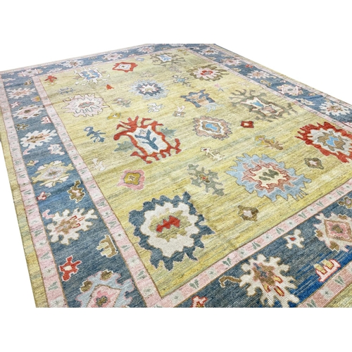 121 - FINE TURKISH OUSHAK CARPET, 415cm x 317cm.