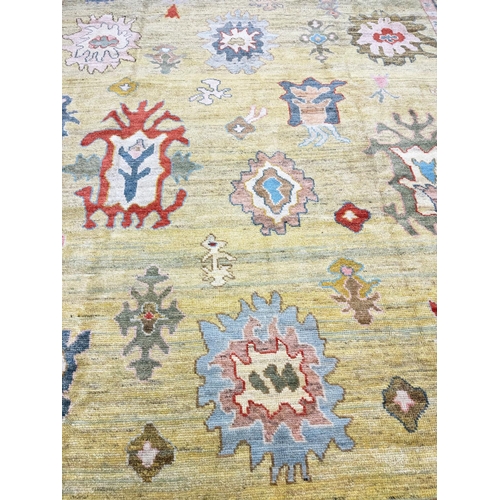 121 - FINE TURKISH OUSHAK CARPET, 415cm x 317cm.