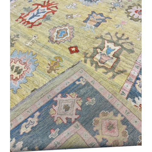 121 - FINE TURKISH OUSHAK CARPET, 415cm x 317cm.