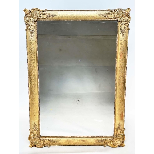 190 - WALL MIRROR, 19th century French giltwood and gesso moulded rectangular with acanthus corners and be... 