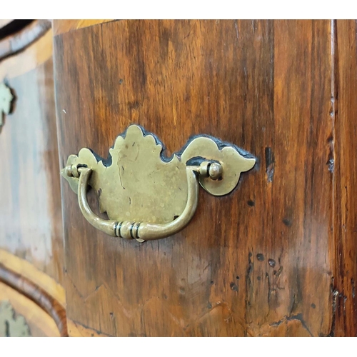 293 - COMMODE, 18th century Italian walnut and banded with three shaped drawers, 88cm x 52cm x 80cm H.