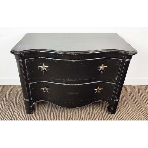 294 - GRANGE COMMODE, of serpentine form with two drawers with star detail handles, ebonised with distress... 