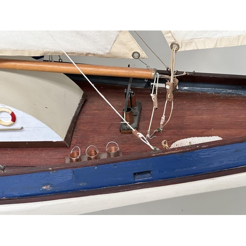 155 - POND YACHT, large twin mast scratch built with detail, sails and lead weight keel, all on stand with... 