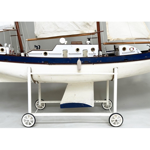 155 - POND YACHT, large twin mast scratch built with detail, sails and lead weight keel, all on stand with... 