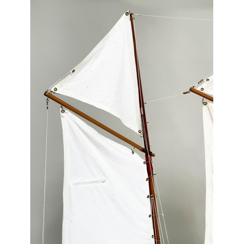 155 - POND YACHT, large twin mast scratch built with detail, sails and lead weight keel, all on stand with... 