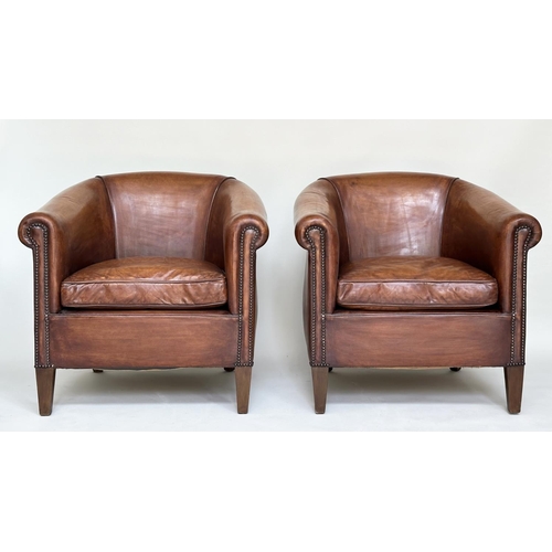 187 - TUB ARMCHAIRS, a pair, brass studded hand finished soft tan brown leather with bow backs and taperin... 