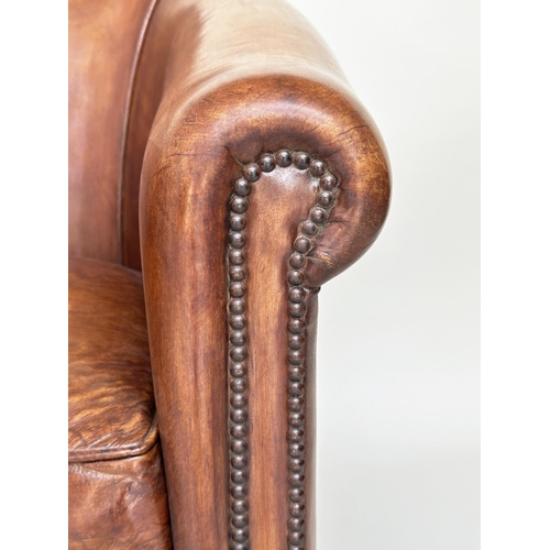 187 - TUB ARMCHAIRS, a pair, brass studded hand finished soft tan brown leather with bow backs and taperin... 