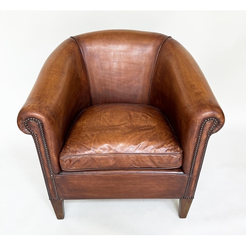 187 - TUB ARMCHAIRS, a pair, brass studded hand finished soft tan brown leather with bow backs and taperin... 