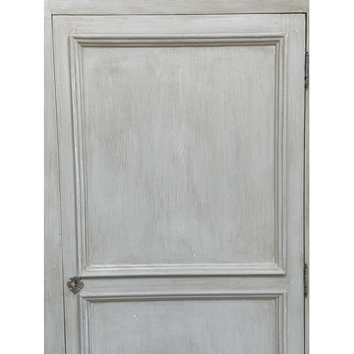 199 - ARMOIRE, French style grey painted with a panelled door enclosing full height hanging space above a ... 