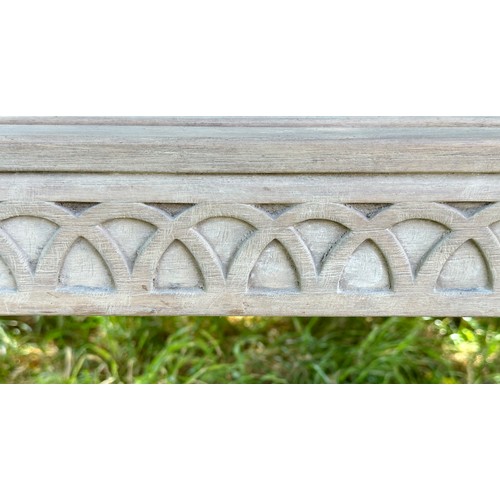 273 - COLONIAL STYLE GARDEN BENCH, weathered teak with outswept scrolled and carved uprights and slatted s... 