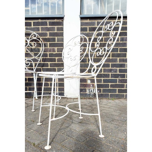 390 - GARDEN SUITE, wrought iron comprising a slatted two seater bench and four matching chairs, scrollwor... 