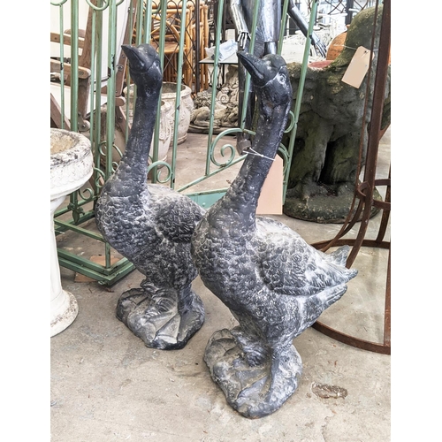 415 - SCULPTURAL GEESE, a set of two, cast metal, 75cm H approx. (2)