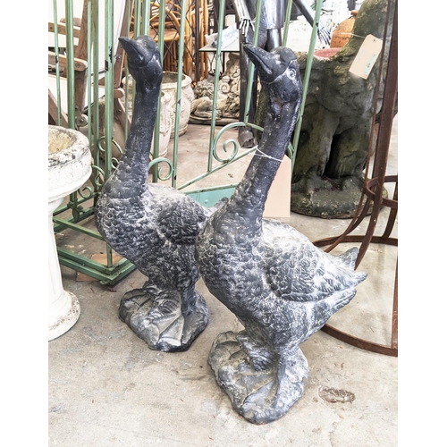 415 - SCULPTURAL GEESE, a set of two, cast metal, 75cm H approx. (2)