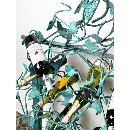 212 - N. M. KENNEDY SCULPTURED WINE RACK, scrolling grapevine metal work, in painted Verdigris finish, sig... 